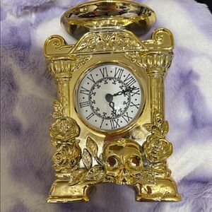 Bath & Body works Halloween skull clock candle holder.